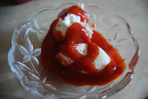 Poached eggs with ketchup