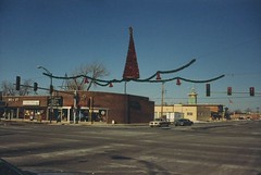 The corner of West 95th Street and South kedzie Avenue during the Christmas Holiday Season. Evergreen Park Illinois. December 1988.