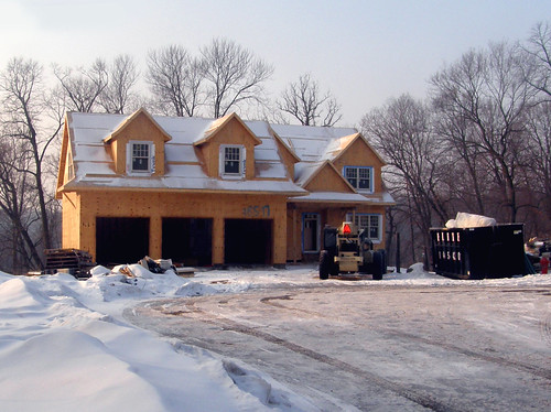 A 3 Car Garage, with house attached.