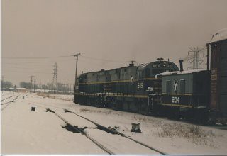 Eastbound Belt Railway of Chicago transfer train leaving Clearing Yard. Photographed at Hayford Junction. Chicago Illinois. January 1987.