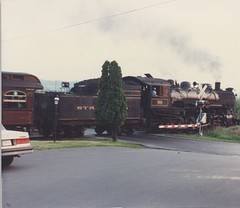 Strasburg Railroad # 90 and train returning to the East Strasburg station. Strasburg Pennsylvania. August 1990.