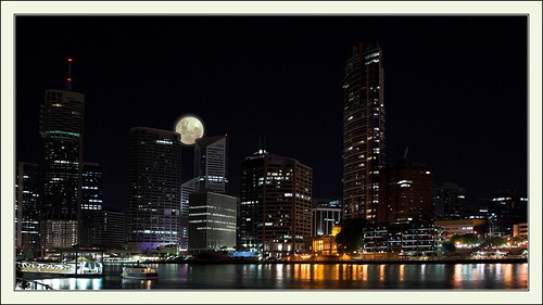 Moon Rises Over Darkened Brisbane