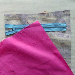 sew the pocket facing to the back of the front panel