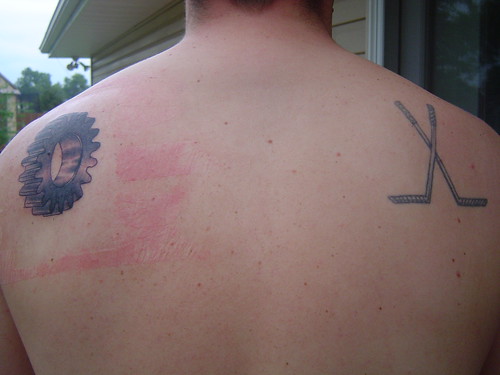 I got my crossed hockey stick tattoo about 7 years ago at Villain's in Omaha