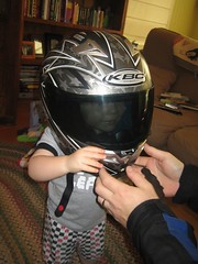 Ben in Daddy's helmet