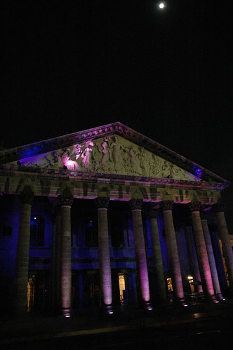 Theater with purple lights under a Tsok Kor Moon, Guadalajara public square, Jalisco, Mexico by Wonderlane