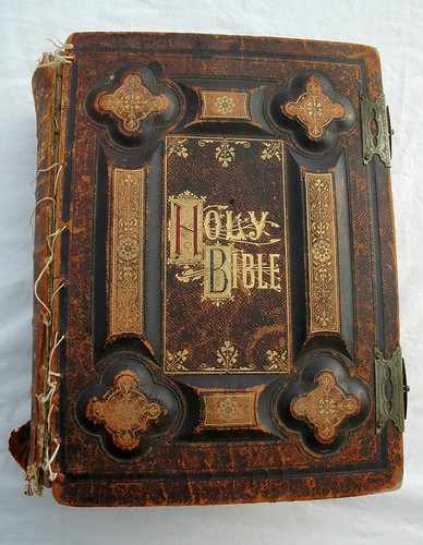 Holy Bible, dated 1885, antique gold lettering, leather and board, held together with dental floss by Wonderland