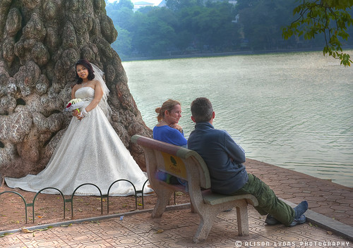 "I thought you said this was a romantic spot, I'm putting my shoes back on." by alison lyons photography