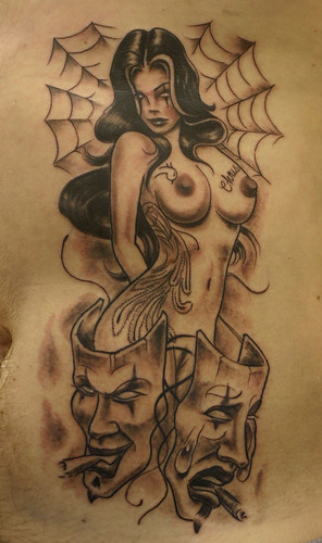 Boog-Pinup Tattoo by The Tattoo Studio.