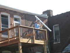 Replacing the old bad gutter with new seamless gutters - Taking down the old gutter