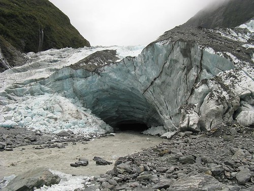 ice cave, river exiting the glacier