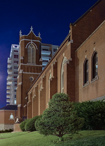 Saint Joseph Roman Catholic Church, in Clayton, Missouri, USA - exterior side at night