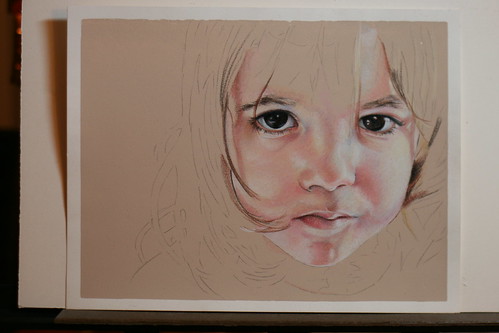 Photo of as yet untitled colored pencil portrait of my daughter.