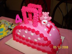Reanna's pink Care Bear purse cake