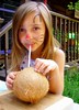 Drinking coconut water. (c) Sienna Wildfield