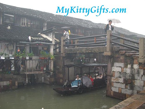 Hello Kitty's View of Tour Boat Crossing Bridge in Wu Zhen