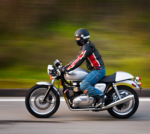 Triumph Thruxton Motorcycle Shot from the side of the road in the hills of