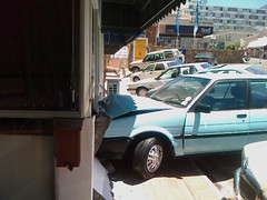 Car crashed into a wall in Kloof Street, Cape Town, Souith Africa (by Louis Rossouw)
