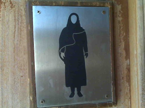 A ladies room sign in Oman