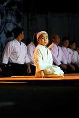 a small child learns self discipline through aikido, a type of martial arts
