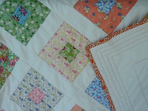 baby quilt detail, back, and binding