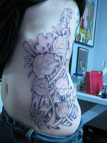 rib tattoo start outline background shading on the left side will be 