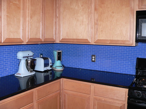 kitchen backsplash with 1x3 cornflower blue subway glass tiles