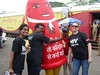 Wake Up Pune team members welcome the inflatable condom to Pune!