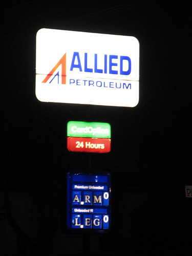 Petrol Station price listings at a petrol station where prices are 'ARM' and 'LEG'