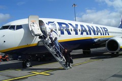 Passengers leaving Ryanair jet