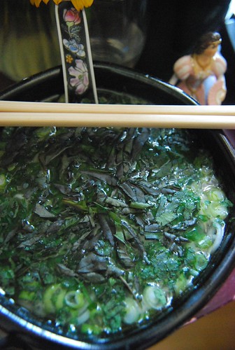 Noodles with soup and fresh herbs