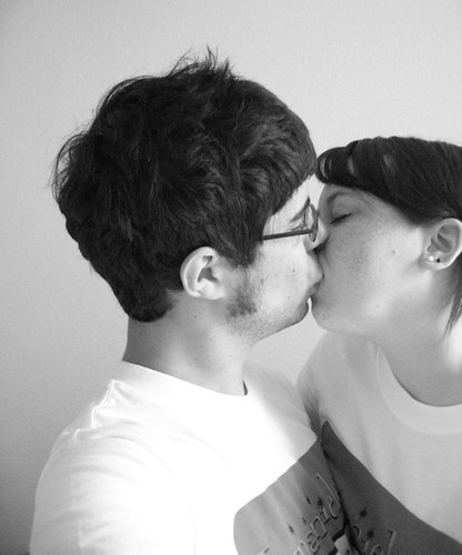 of two people kissing.