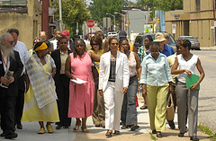  Mayor Sheila Dixon and community leaders take a tour along a stretch of Pulaski Street,
