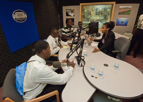 Seniors from Calvert High School Calvert, Texas (L to R) Jamarion Ramirez, Ja’Marcus Ashley, Andre Ross, and Blair Burns have an opportunity to experience the USDA Creative Media and Broadcast Center radio studio with USDA Radio broadcaster Susan Carter. 
