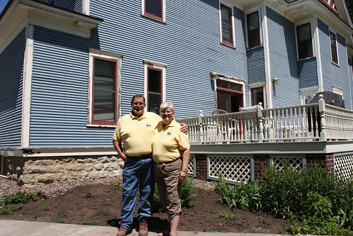 John and Dorothy Priske in front of their home and Bed & Breakfast.