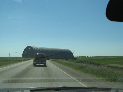 Quonset being moved, near Coronach, SK