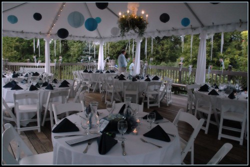 The tent was decorated with paper lanterns in different sizes and shades of