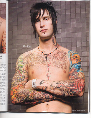 and the chest tattoo of the words FICTION like the Rev as my life has been 