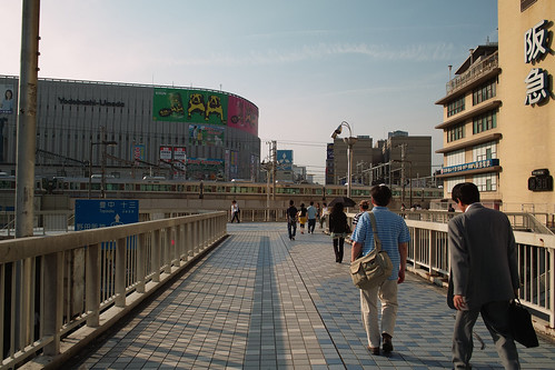 On the pedestrian overpass in front of Osaka Station