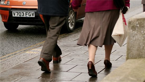 elderly couple walking