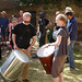 GMF tutor Roland Melia joins students in percussion workshop