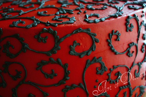 Red Cake with Black Scrolls - detail