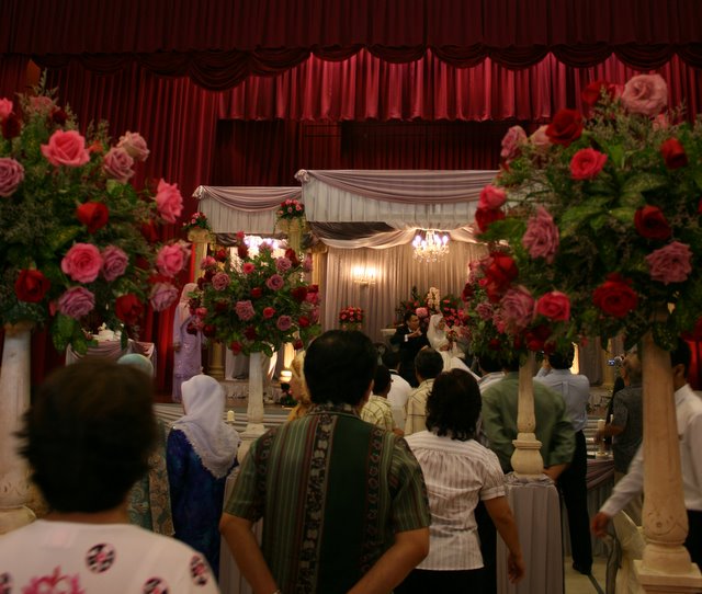 Bersanding - the wedding couple is seated on the ceremonial dias