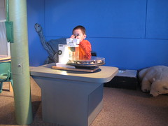 Owen looking through microscope