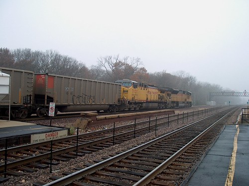 Westbound Union Pacific unit coal train passing through a thick morning fog. River Forest Illinois. November 2006. by Eddie from Chicago