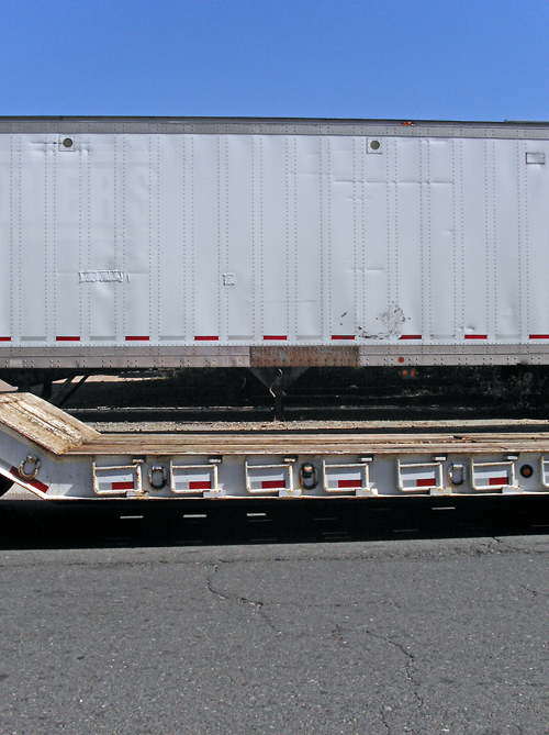 a container and a flatbed trailer, NYC