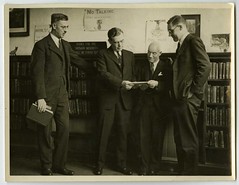 Ernest J Bell and three other men in Canterbury Public Library Younger Members' section