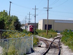Spotting cars on insustrial factory spur sidings. Bensenville Illinois. September 2007.