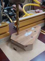 We used a drill press to drill the peg holes to be perpendicular to the surface of the peghead.