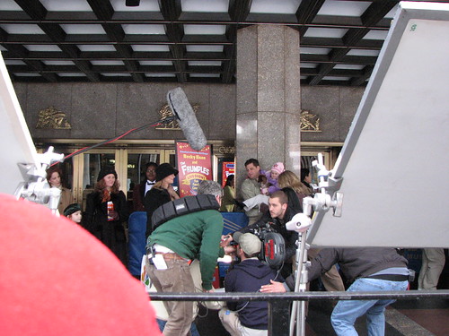 Back at Radio City Music Hall the extras line up and filming begins on the 30 Rock season opener